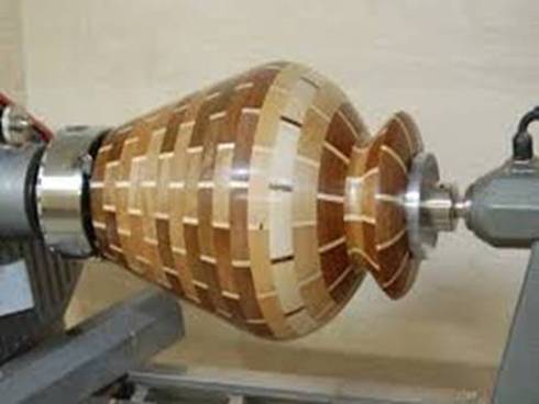Amazing segmented hollow form. Can't imagine how long that took to glue together